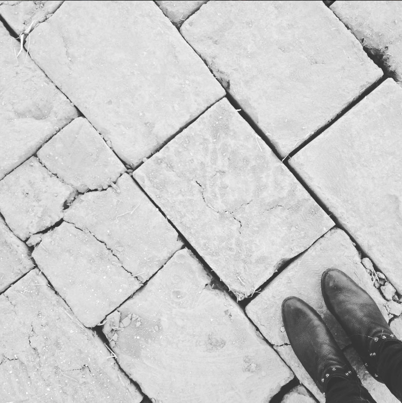 feet on stone walkway