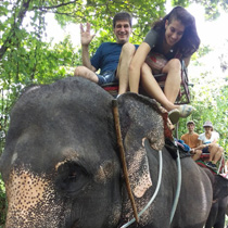 Tabathas dad riding an elephant